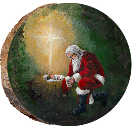 Santa Kneeling at Manger